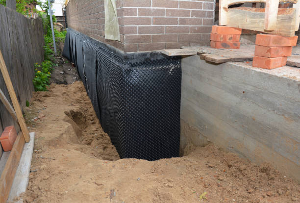 Happy homeowners after waterproofing job in Ceresco